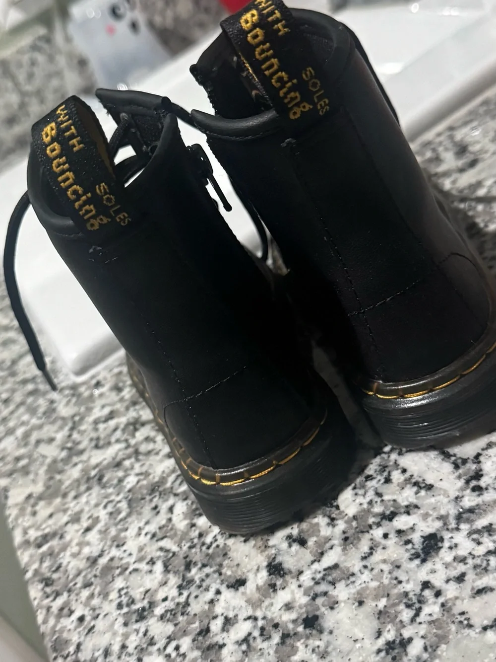 Dr. Martens Black Lace-Up Platform Boots with Yellow Stitching